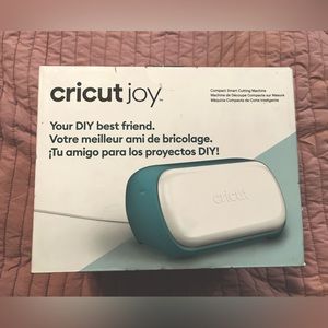 Cricut Joy Cutting Machine (New-Never Opened). Comes with starter tool set.